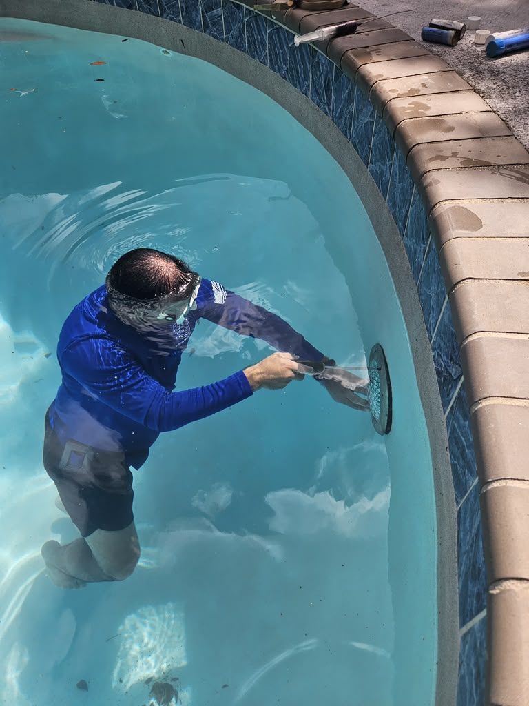 Technician working on spa equipment